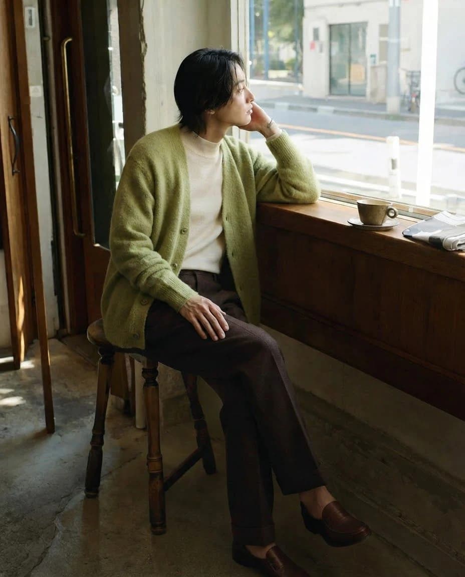 AI outfit idea with relaxed tonal layers in a seated cafe portrait